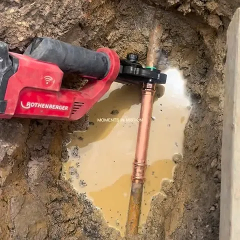Excavating to expose a leaking pipe