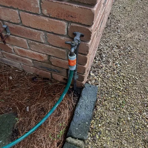 Testing a garden tap connection for leaks