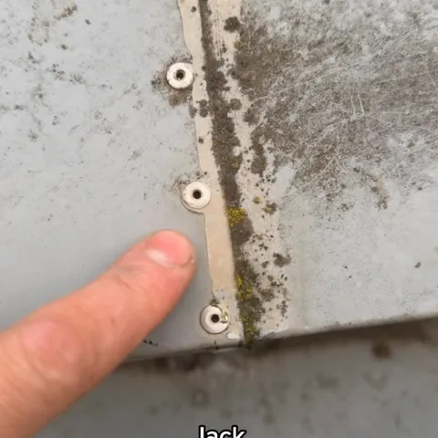 Close inspection of a pipe fitting on site